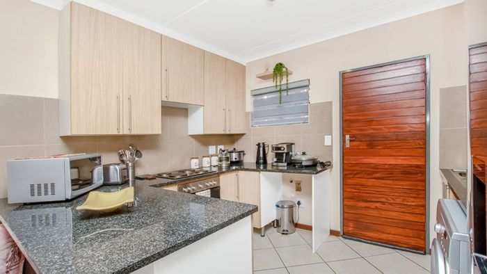 For Sale: Apartment in Noordwyk with pool, clubhouse, security, and prepaid electricity.