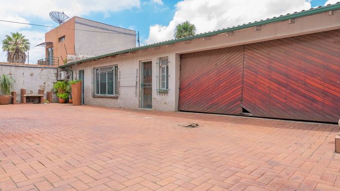 Charming Kensington House for Sale with Cottage and Established Gardens