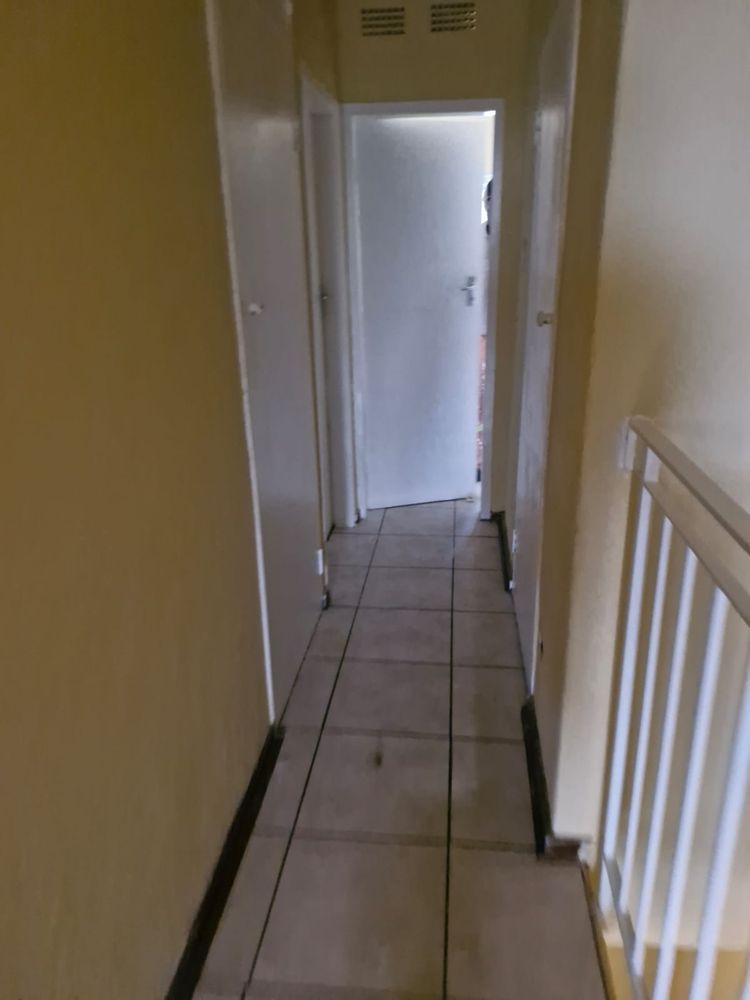 Corridor between bedrooms