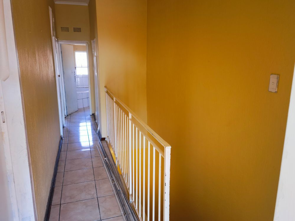 Corridor between bedrooms