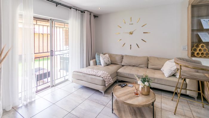 To Rent: 2-Bedroom Apartment in Noordwyk with Open Plan Living and Secure Parking.