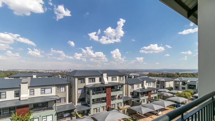 For Sale: 2-Bedroom Apartment in Carlswald with Balcony, Pool, and Fitness Center.