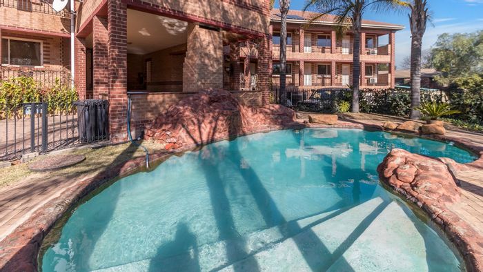 For Sale: Glen Austin AH Lodge with 27 bedrooms, pool, and expansive grounds.