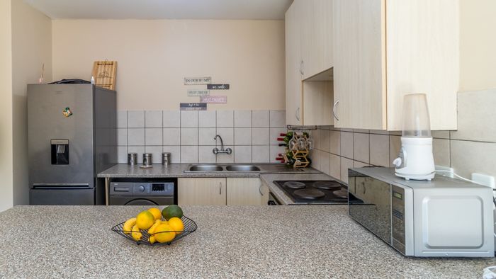 1-Bedroom Apartment For Sale in Grand Central with Covered Parking and Laundry Access.