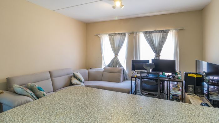 For Sale: 1-Bedroom Apartment in Grand Central with Covered Parking and Laundry Access.