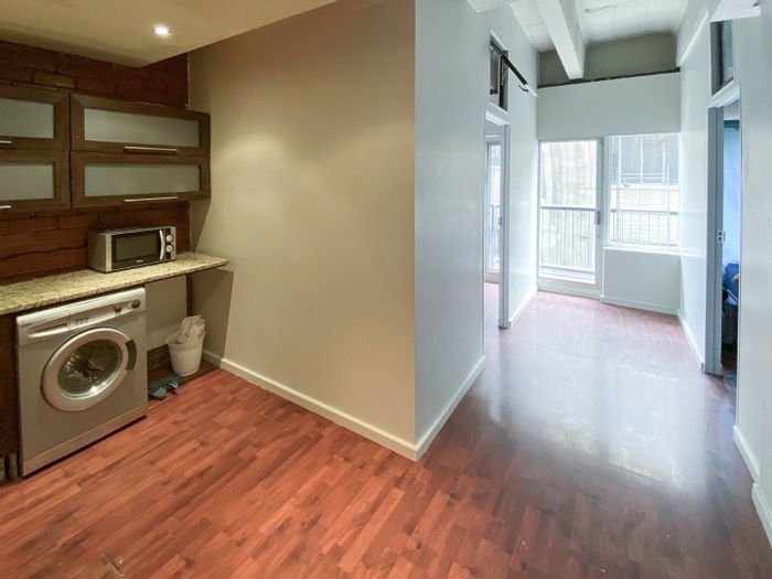 Furnished 2-bedroom apartment in Braamfontein, free WiFi, backup power, for sale.