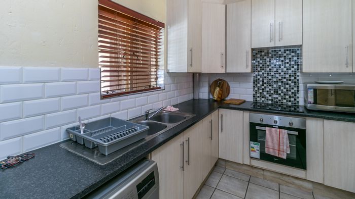 3-Bedroom Apartment For Sale in Buccleuch with garden, pool, and parking.