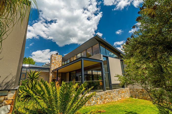 For Sale: House in Waterfall Country Estate with spacious living, flatlet, and gardens.