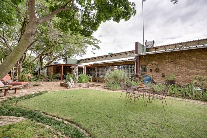 For Sale: Boekenhoutskloof AH Small Holding with 3 homes, boreholes, and irrigation.