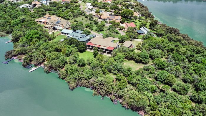 Sable Hills House For Sale: Waterfront views, entertainment area, pool, and gym.