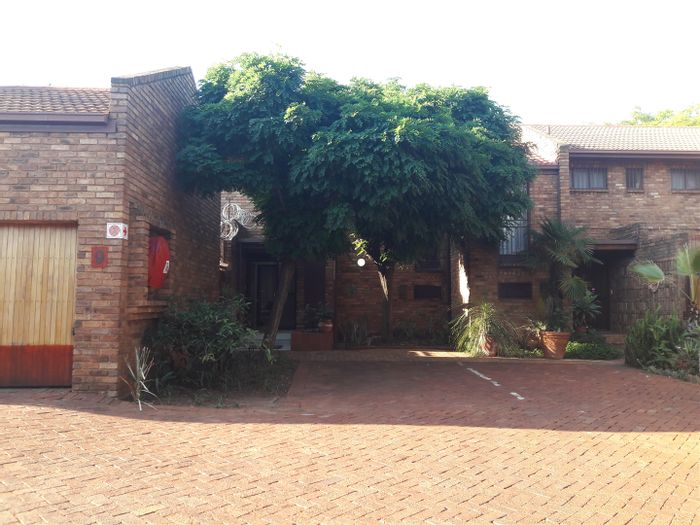 For Sale: Spacious 4-Bedroom Townhouse in Hatfield with Garden and Security.