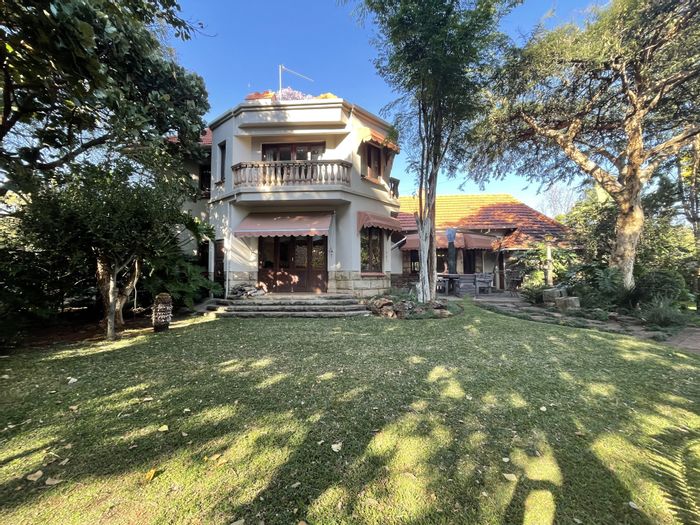 Historic Brooklyn house for sale with garden, office, and spacious living areas.
