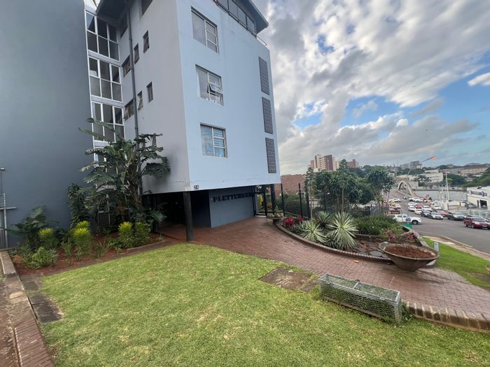 Westridge Townhouse For Sale: 2 bedrooms, balcony views, communal garden, secure parking.