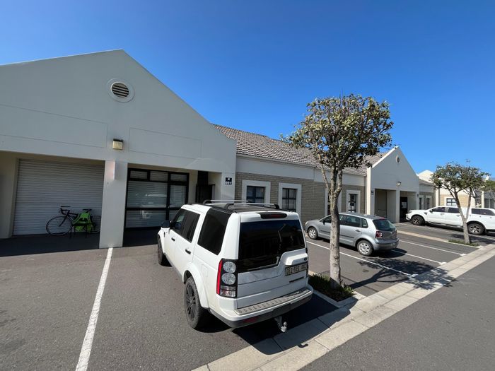 For Sale: 102m² Industrial Unit in Montague Gardens with parking and security.