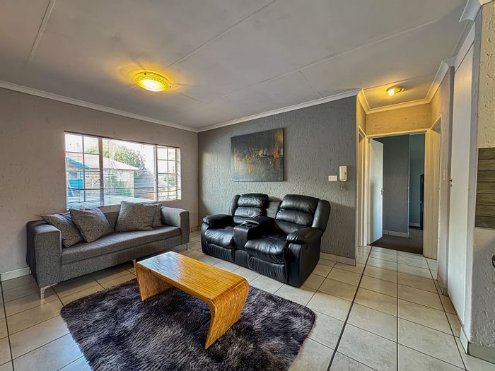 For Sale: 2-Bedroom Apartment in Kenleaf with communal braai area and covered parking.