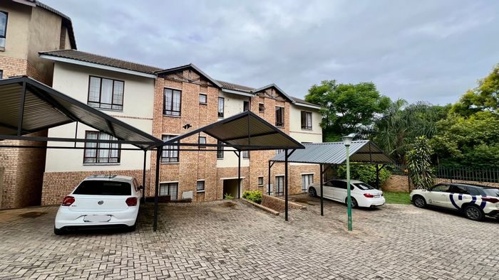 3 Bedroom Apartment To Rent in West Acres with covered patio and carport.
