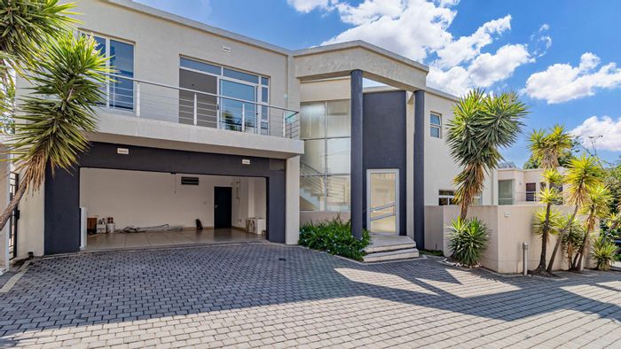 For Sale: 4-Bedroom Townhouse in Sandown with 24-hour security and private garden.