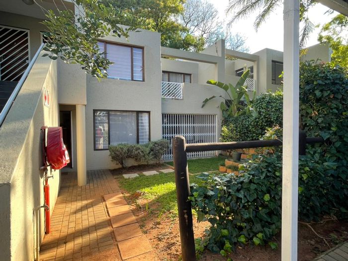 Illovo Townhouse To Rent: 2 Bedrooms, pool access, patio, and 2 parking spaces.