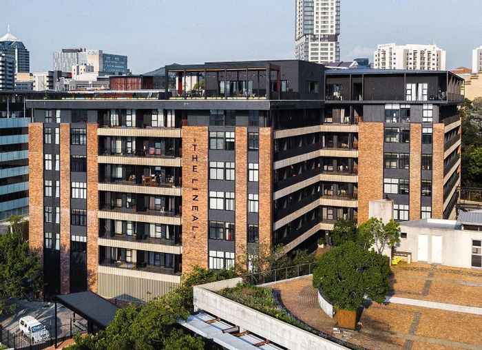 For Sale: Apartment in Sandown with rooftop area, library, and secure parking.