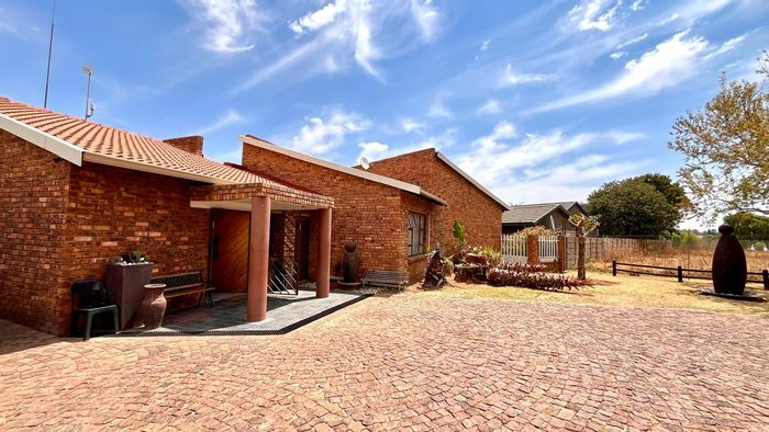 For Sale: House in Dalpark Ext 1 with multiple flats, pool, and spacious yard.