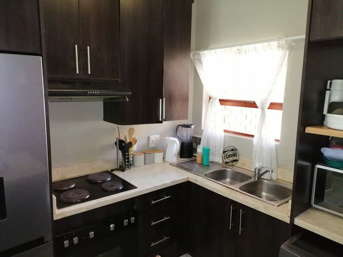 For Sale: Townhouse in Pretoriuspark with pool, clubhouse, and 24-hour security.