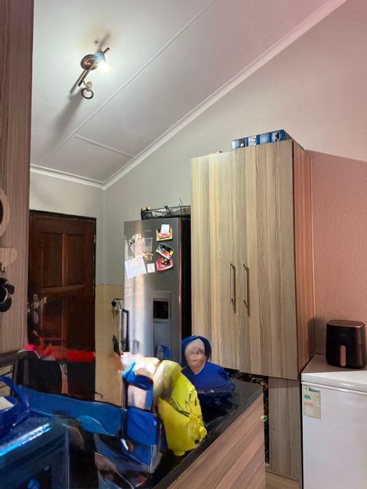 2-Bedroom House for Sale in Witbank Ext 10 with Garage and JoJo Tank.