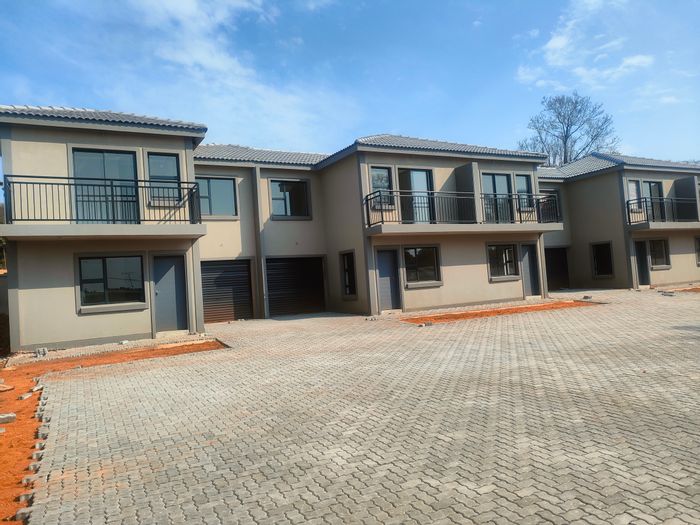 For Sale: Eco-friendly Townhouse in Silverton with private gardens and secure garage.