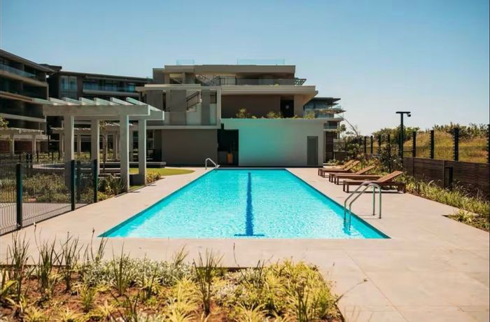 Coastal apartment for sale in Sibaya Precinct with private balcony and amenities.