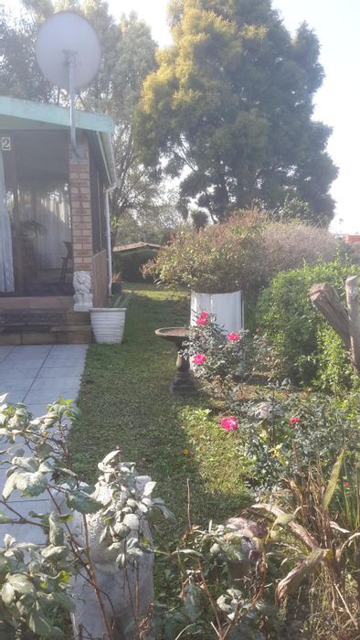 Inchanga House For Sale: 3 bedrooms, secure community, pool, pet-friendly garden.