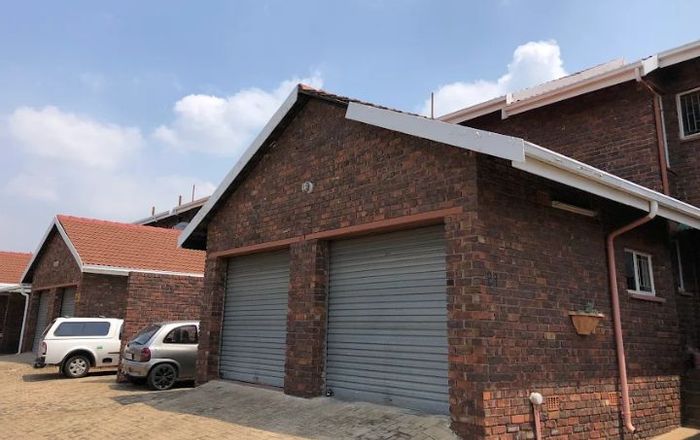 For Sale: Birchleigh Townhouse with private garden, garage, and close to amenities.