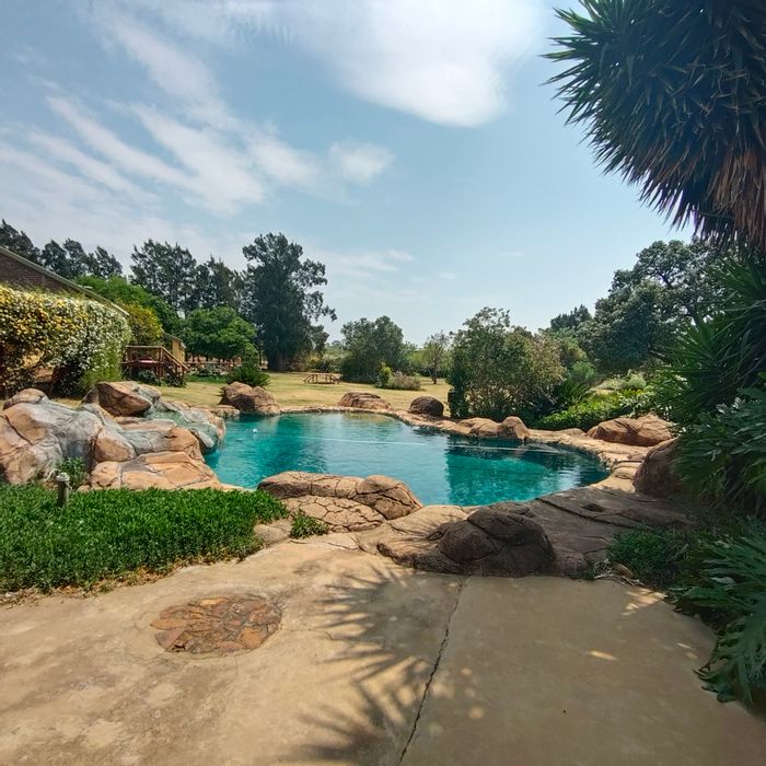 For Sale: Farm in Magaliesburg with cottages, equestrian facilities, and orchards.