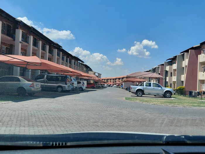 3 Bedroom Apartment in Comet For Sale with balcony, carport, and convenient access.