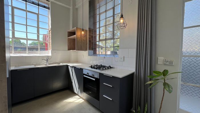 1 Bedroom Apartment To Rent in Braamfontein Werf with 24-hour security and parking.