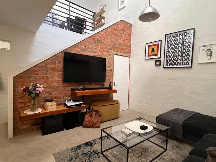 Apartment To Rent in Braamfontein Werf: 1 bed, secure parking, indoor-outdoor patio.