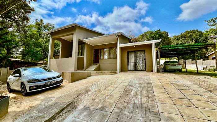 Spacious Sonheuwel house for sale with flatlet, approved plans, and central location.