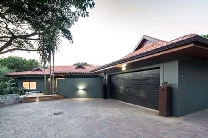 For Sale: House in Zimbali with pool, en-suite bedrooms, and Airbnb potential.