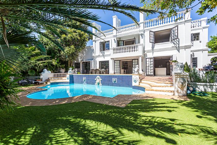 For Sale: Spacious 5-bedroom house in Melkbosstrand Central with pool and garden.