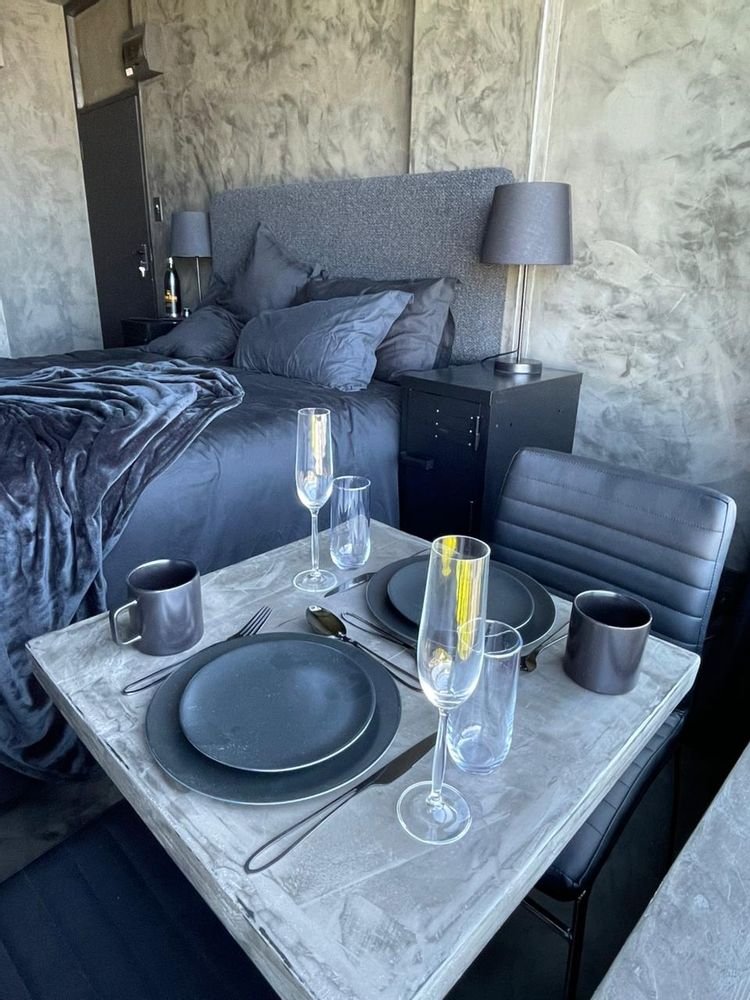 Table and chairs seating for two