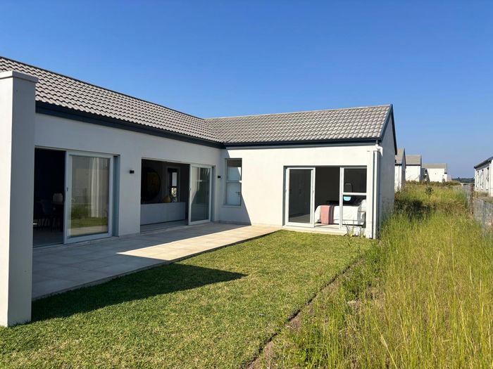 For Sale: Townhouse in Ballito Central, 2 beds, open-plan living, covered parking.