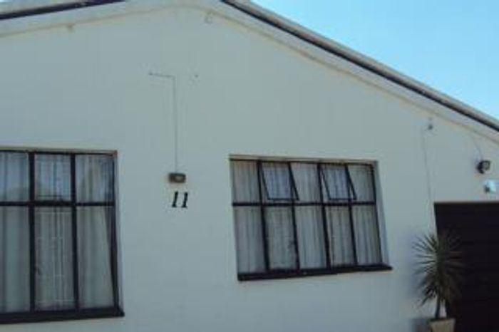 For Sale: House in Kempton Park West with 3 beds, 2 baths, and garages.