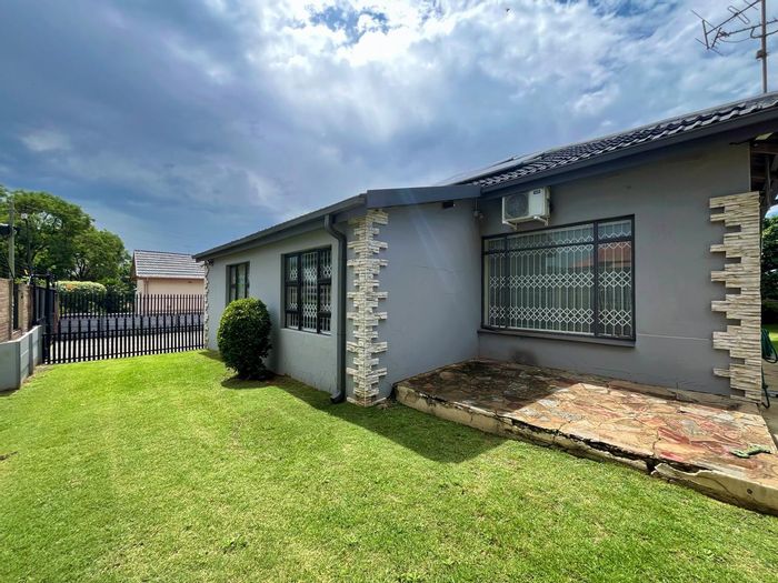House For Sale in Brakpan Central: Solar system, security, flatlet, pool, and braai area.