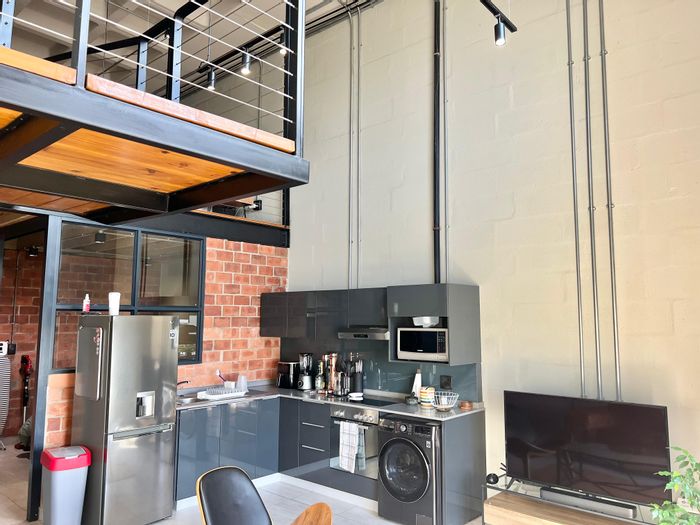 For Sale: 2-Bedroom Apartment in Ballito Central, above Odyssey Mall, with balcony.