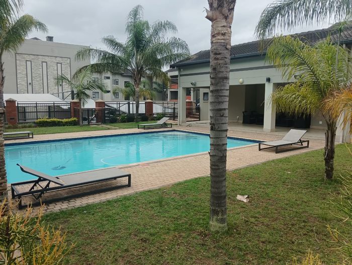 For Sale: Apartment in Umhlanga Ridge with gym, pools, and balcony access.