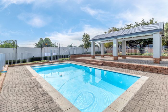 1-Bedroom Apartment To Rent in Chartwell with private patio and pool access.