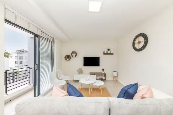 For Sale: Waves Edge Apartment with pool, beach access, and Airbnb potential.