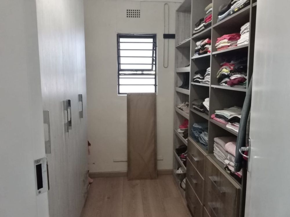 Main Bed 1 walk in cupboard