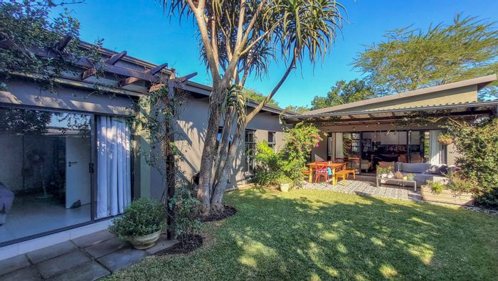 For Sale: 4-Bedroom House in Palm Lakes Estate with garden, double garage, and security.