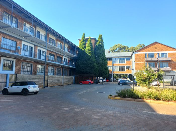 For Sale: Apartment in Braamfontein Werf with 24-hour security and greenbelt access.