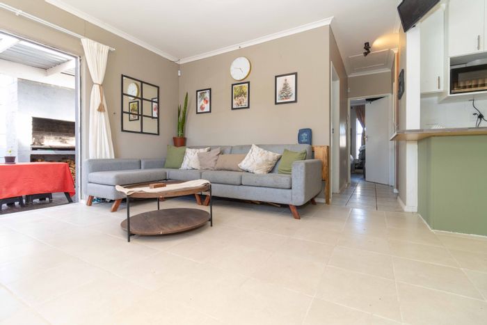 For Sale: House in Parklands with pool, braai area, and secure parking.