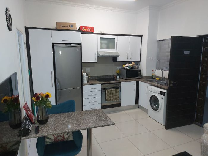 1-Bedroom Apartment To Rent in Umhlanga Ridge with gym, pool, and 24-hour security.